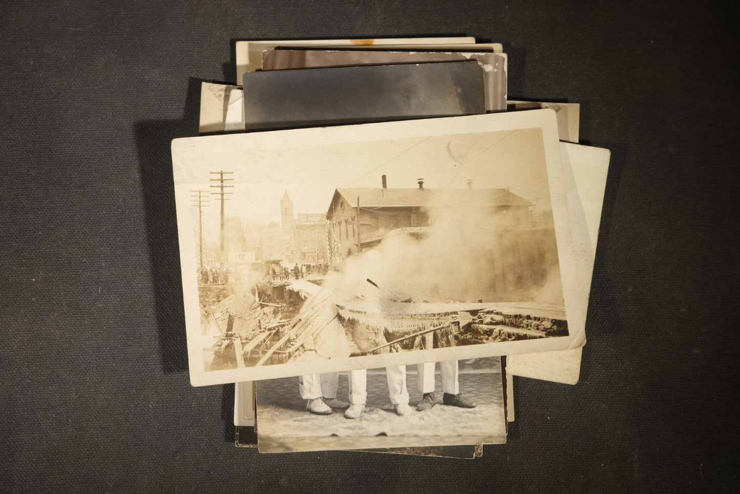 Grouping of approximately 40 Antique Real Photo Postcards R.P.P.C. including Military Soldier Portrait, Ocean Liner, Marching Band, and Portraits