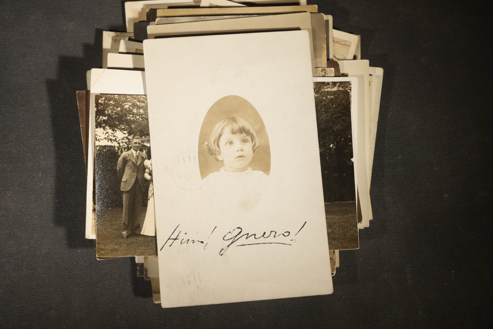 Grouping of approximately 40 Antique Real Photo Postcards R.P.P.C. including Military Soldier Portrait, Ocean Liner, Marching Band, and Portraits