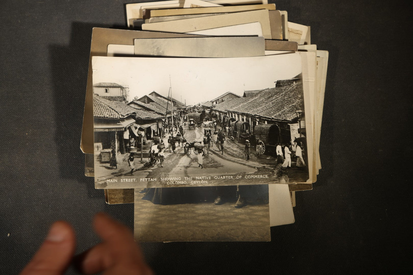 Grouping of approximately 40 Antique Real Photo Postcards R.P.P.C. including Military Soldier Portrait, Ocean Liner, Marching Band, and Portraits