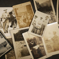 Lot 130 - Grouping of 10+ Antique and Vintage Snapshot Photographs Including Girl Sitting on Rocks, Parlor Interior, and Family Portraits