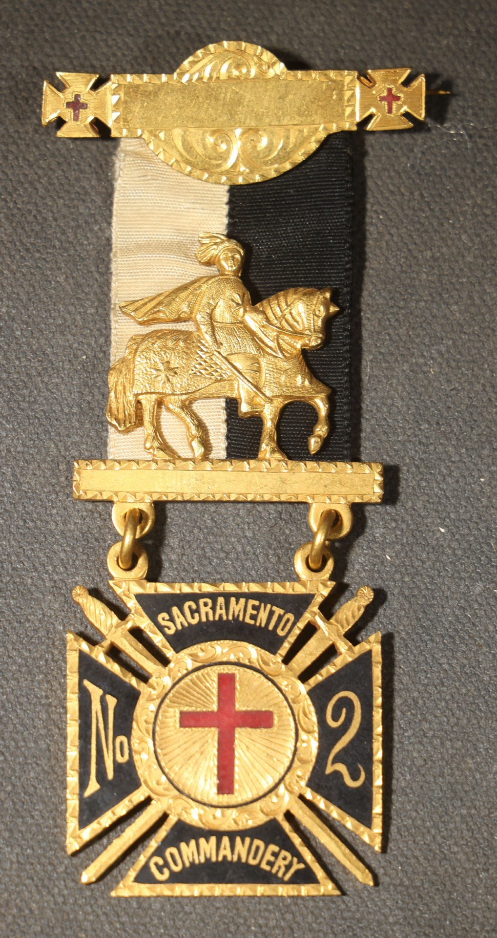 Grouping of Four Antique Masonic and Knights Templar Ribbon Medals including Washington No. 4 K.T. Newport, Rhode Island, Sacramento No. 2 Commandery, and Grand Encampment K.T. U.S.A. Hugh McCurdy Grand Master