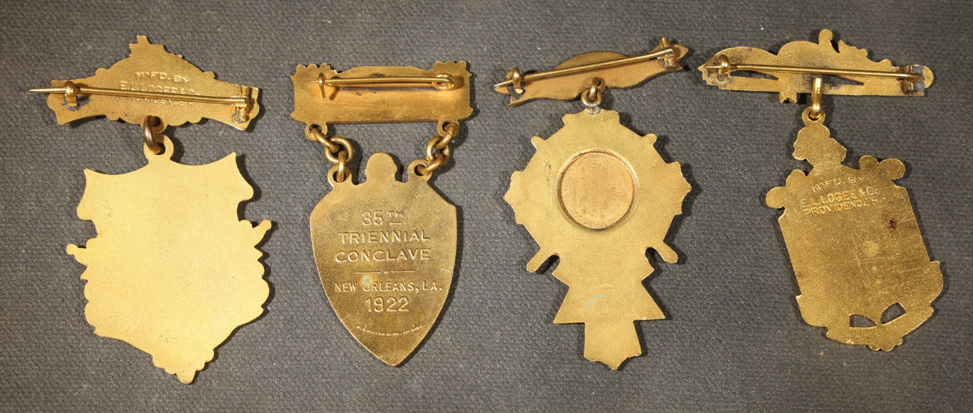 Grouping of Four Antique Knights Templar Commandery Enameled Medals Including Pilgrim Commandery of Lowell, Godfrey De Bouillon Commandery of Fall River, Dewitt Clinton Commandery No. 27 of New York, and Humboldt Park No. 79 of Chicago, Illinois