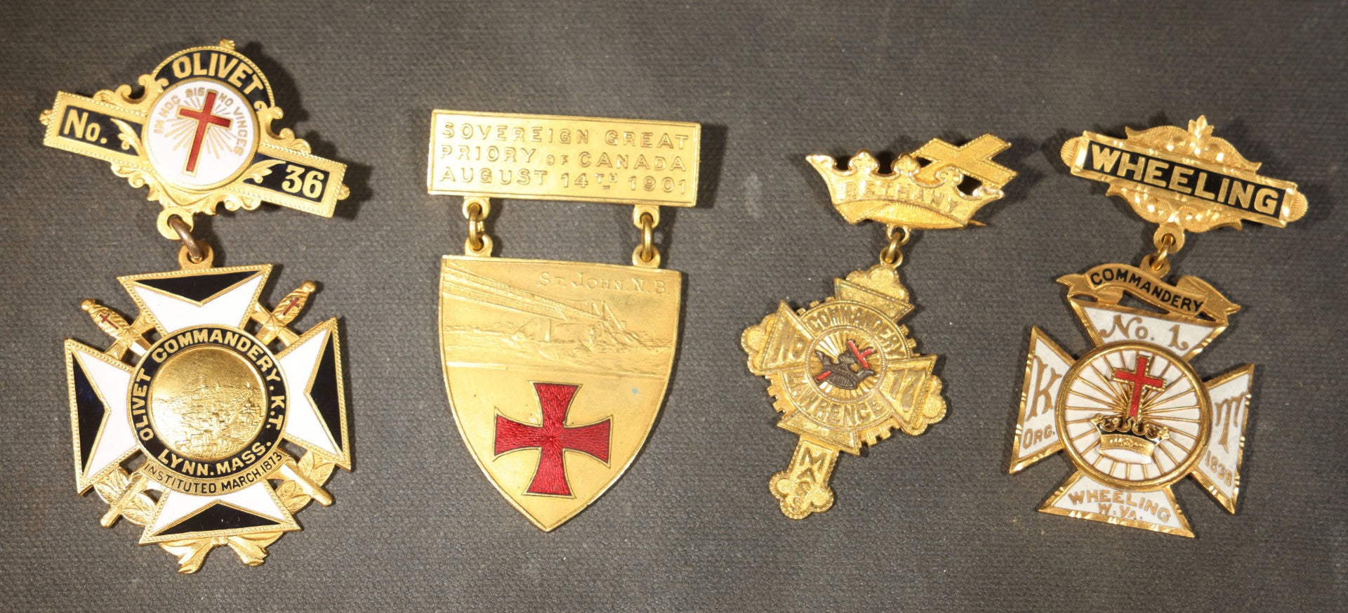 Grouping of Four Antique Knights Templar Medals and Badges Including Wheeling No. 1 Commandery K.T., West Virginia, Olivet No. 36 Commandery K.T., Lynn, Massachusetts, and Sovereign Great Priory of Canada, St. John, New Brunswick, 1901
