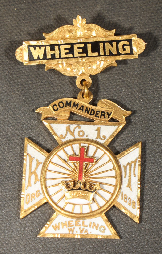 Grouping of Four Antique Knights Templar Medals and Badges Including Wheeling No. 1 Commandery K.T., West Virginia, Olivet No. 36 Commandery K.T., Lynn, Massachusetts, and Sovereign Great Priory of Canada, St. John, New Brunswick, 1901