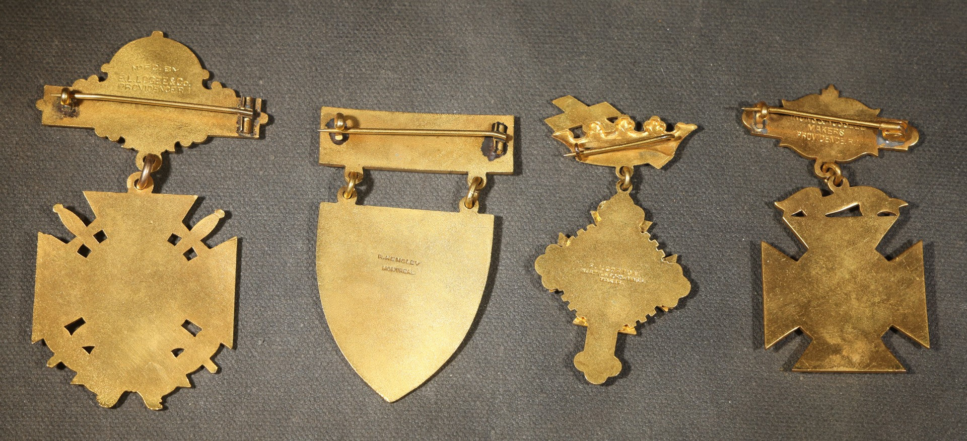 Grouping of Four Antique Knights Templar Medals and Badges Including Wheeling No. 1 Commandery K.T., West Virginia, Olivet No. 36 Commandery K.T., Lynn, Massachusetts, and Sovereign Great Priory of Canada, St. John, New Brunswick, 1901