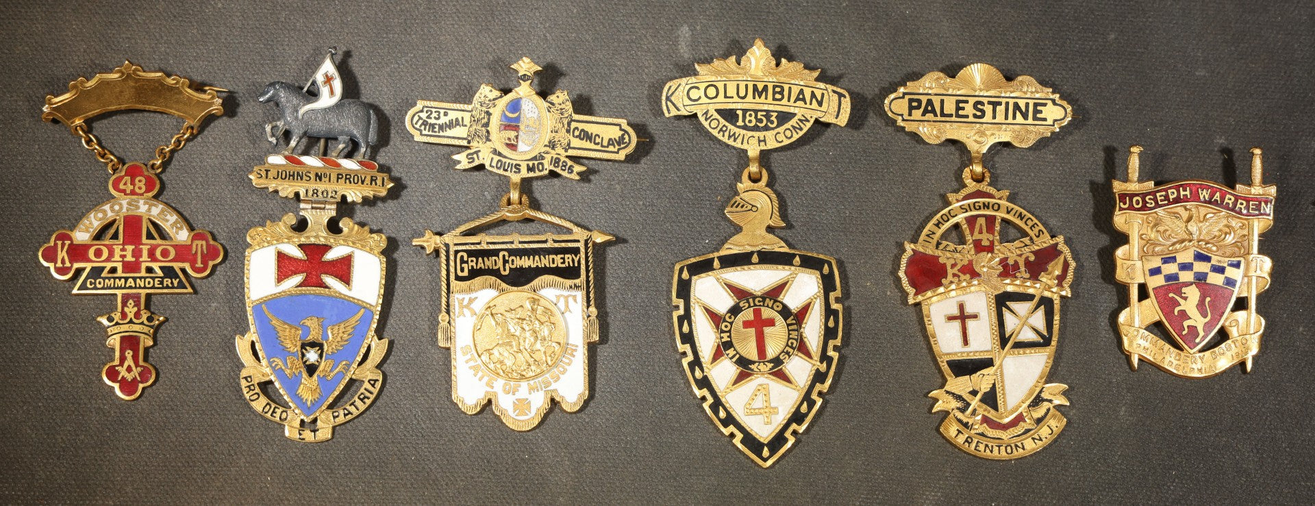 Grouping of Five Antique Knights Templar Enameled Badges Including Joseph Warren Commandery Boston 1919, Palestine Commandery Trenton, Columbian Commandery Norwich 1853, 23rd Triennial Conclave St. Louis 1886, and St. Johns No. 1 Providence, RI