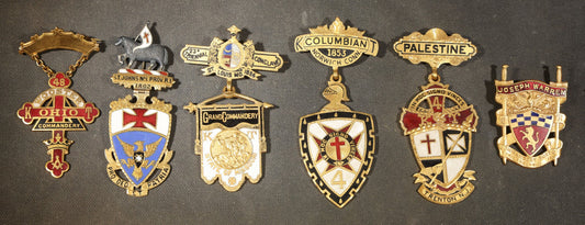 Grouping of Five Antique Knights Templar Enameled Badges Including Joseph Warren Commandery Boston 1919, Palestine Commandery Trenton, Columbian Commandery Norwich 1853, 23rd Triennial Conclave St. Louis 1886, and St. Johns No. 1 Providence, RI