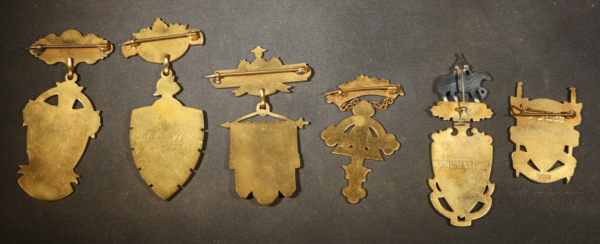 Grouping of Five Antique Knights Templar Enameled Badges Including Joseph Warren Commandery Boston 1919, Palestine Commandery Trenton, Columbian Commandery Norwich 1853, 23rd Triennial Conclave St. Louis 1886, and St. Johns No. 1 Providence, RI