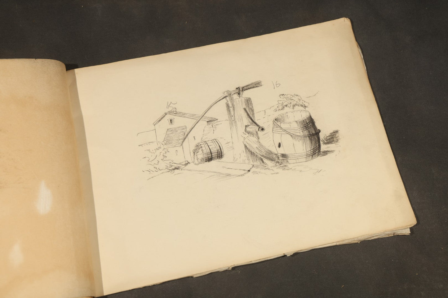 Antique Pencil Sketchbook with Rural Scenes, Still Life Studies, and Landscapes including Farm Equipment, Cow, Water Pump, and Towered Buildings