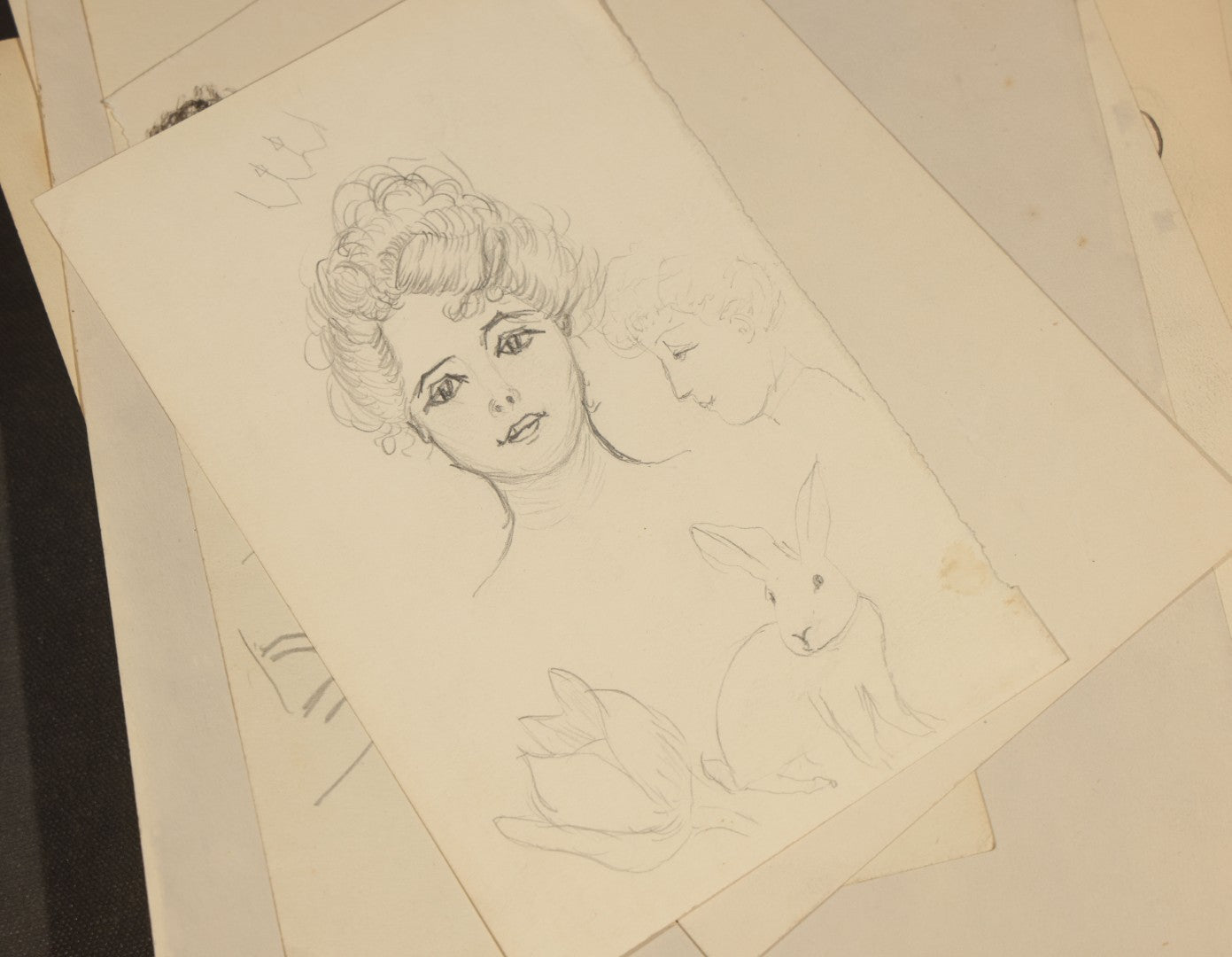 Grouping of 21 Antique Pen and Pencil Drawings on Paper of Women in Fashion, including Portraits, Seaside Bather, and Full-Figure Studies, One Dated June 1901
