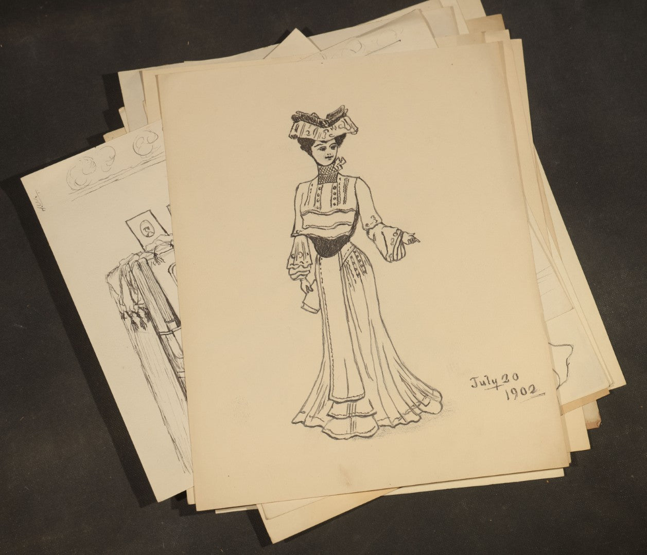 Grouping of 21 Antique Pen and Pencil Drawings on Paper of Women in Fashion, including Portraits, Seaside Bather, and Full-Figure Studies, One Dated June 1901