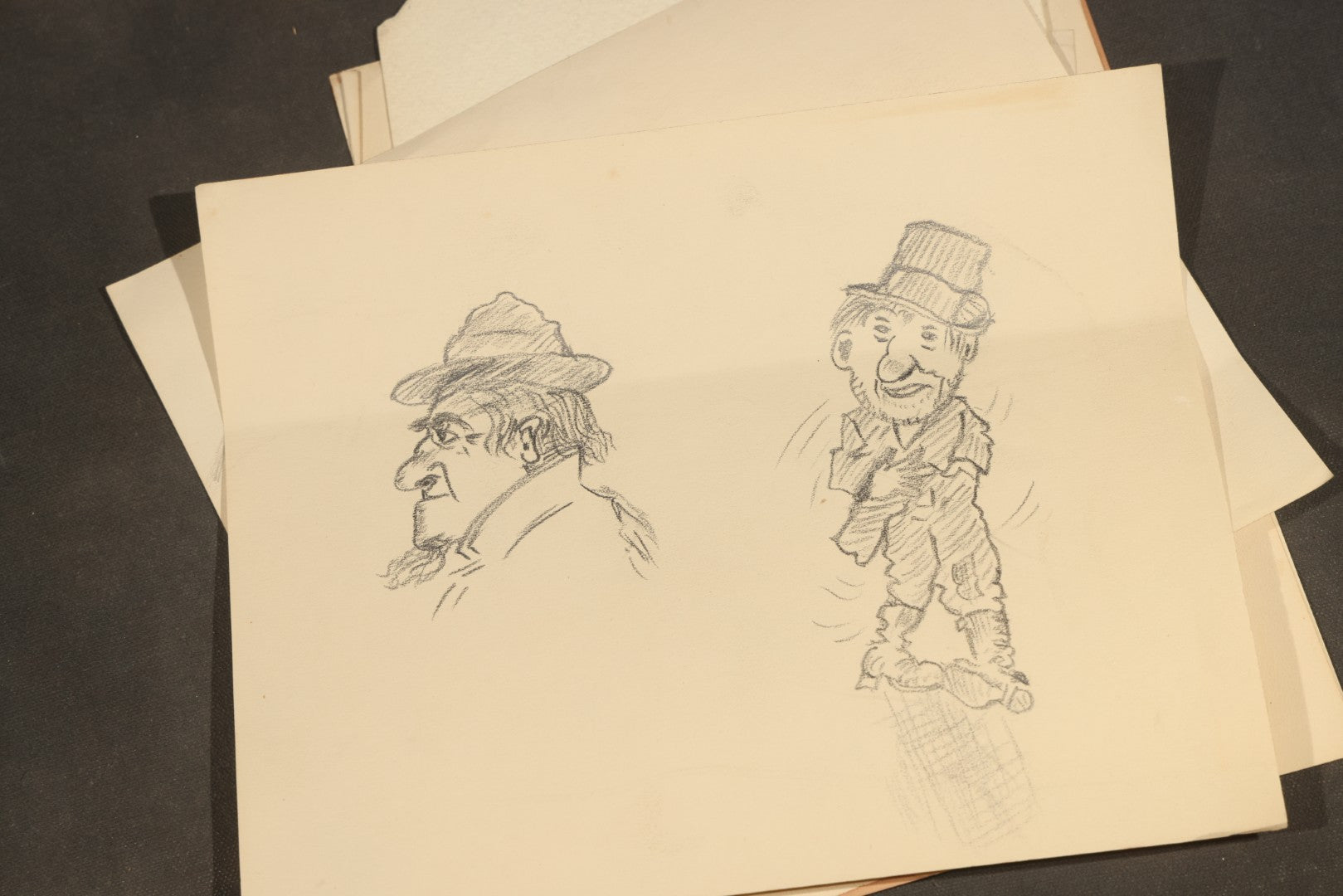 Grouping of 20 Antique Pen and Pencil Sketches including Portraits, Coastal Scene, Goat, Flowers, and "An Old Salt" Pipe Smoker, with Decorative "Sketches" Cover Sheet