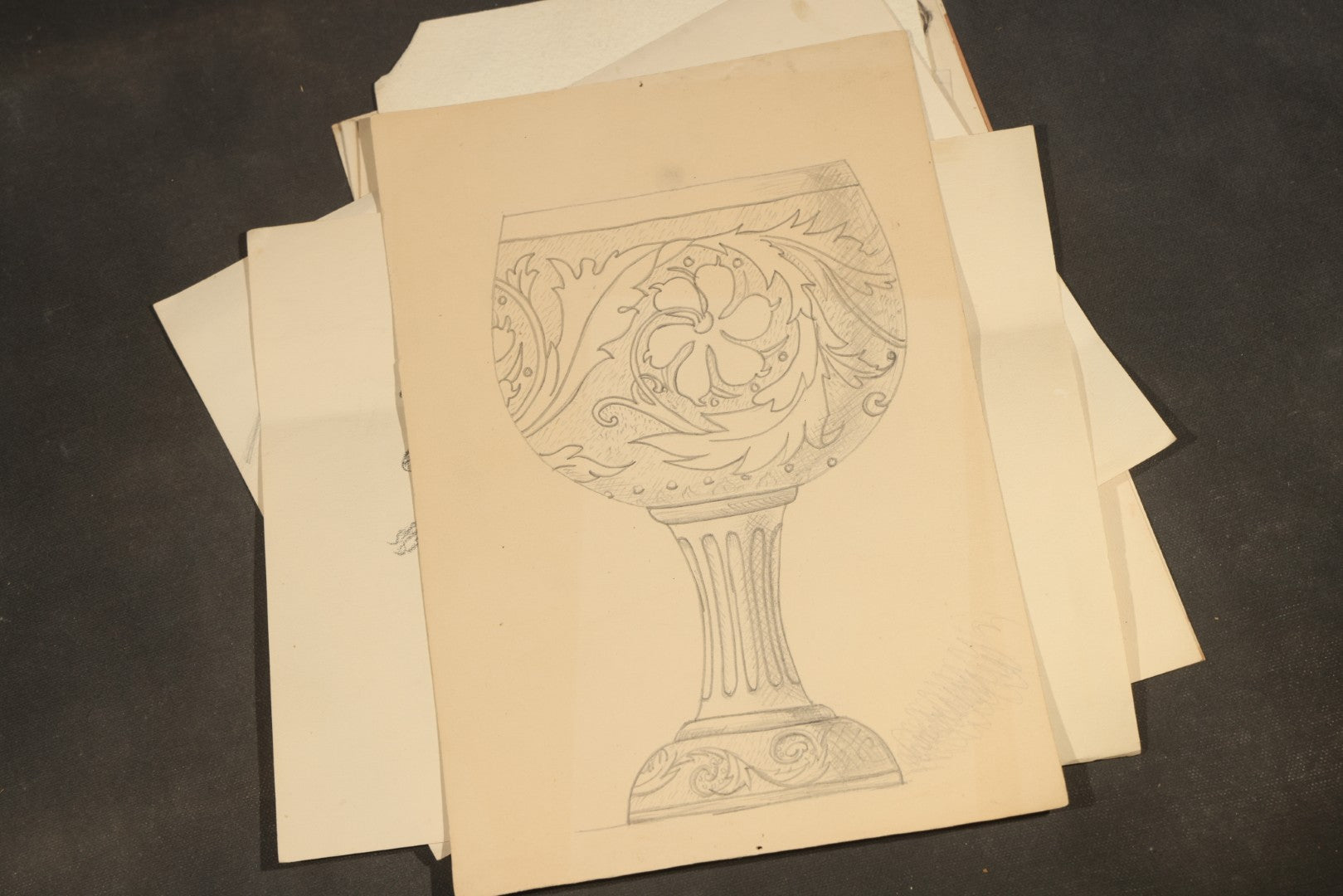 Grouping of 20 Antique Pen and Pencil Sketches including Portraits, Coastal Scene, Goat, Flowers, and "An Old Salt" Pipe Smoker, with Decorative "Sketches" Cover Sheet
