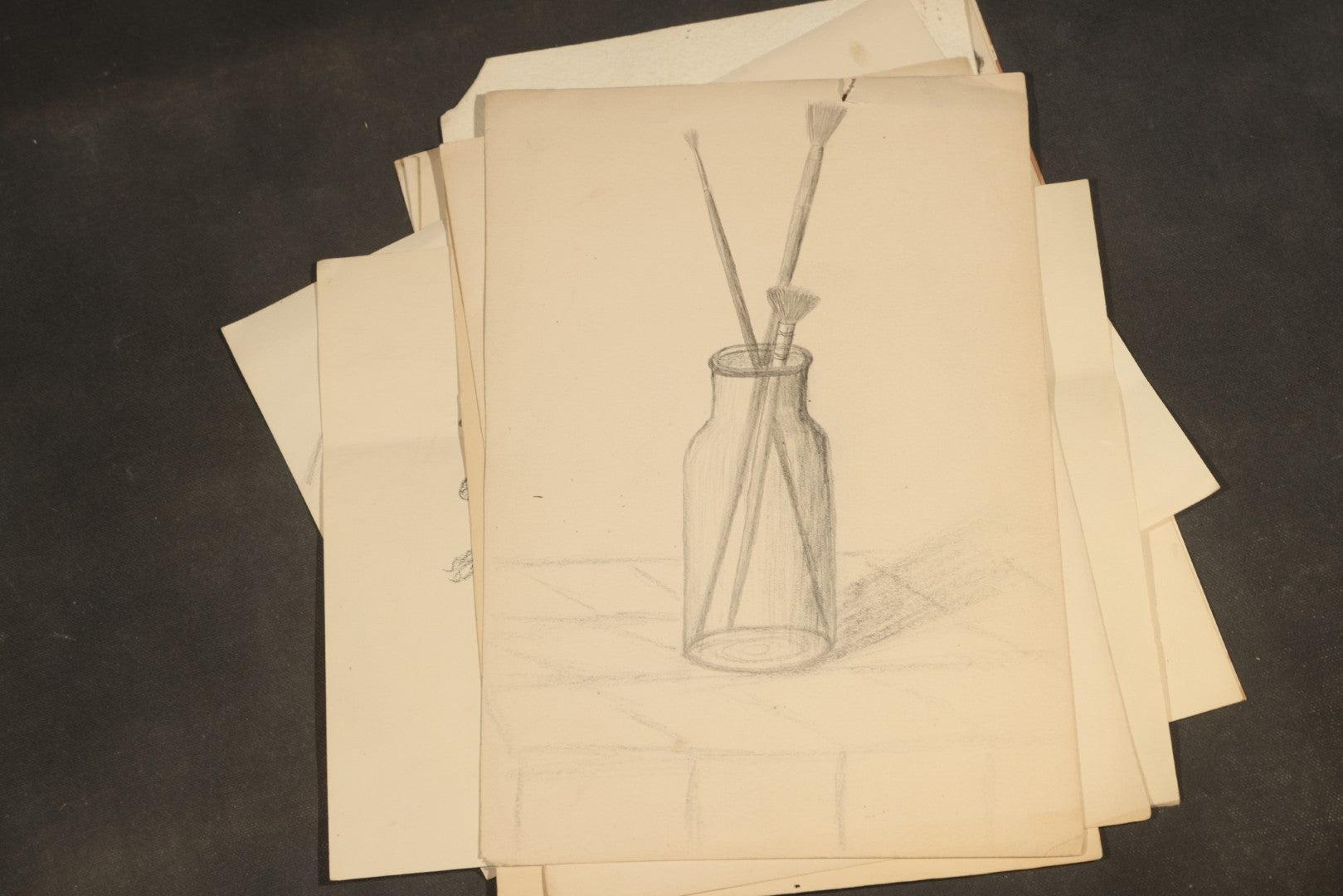 Grouping of 20 Antique Pen and Pencil Sketches including Portraits, Coastal Scene, Goat, Flowers, and "An Old Salt" Pipe Smoker, with Decorative "Sketches" Cover Sheet
