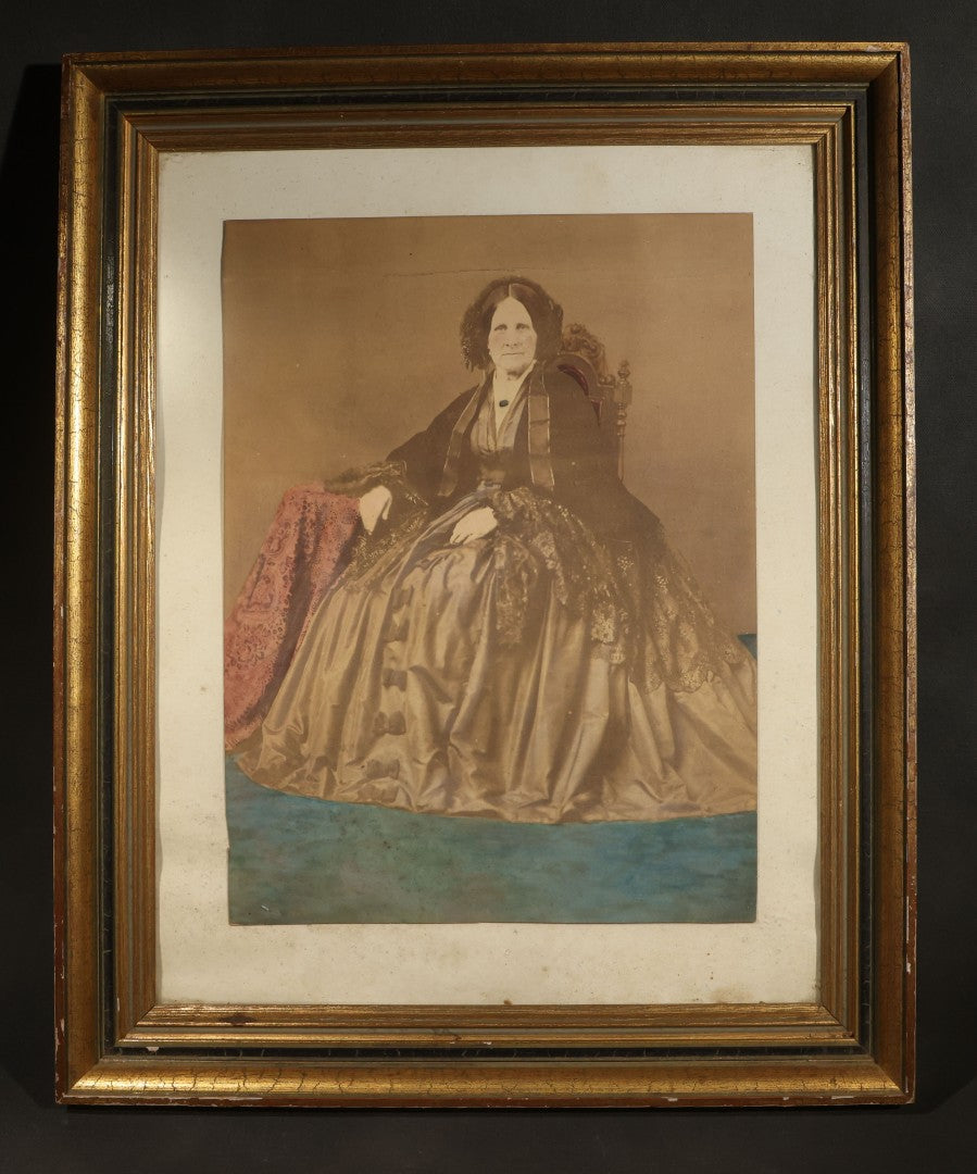 Antique Framed Hand-Colored Photograph of a Seated Elderly Woman in Hoop Skirt Dress