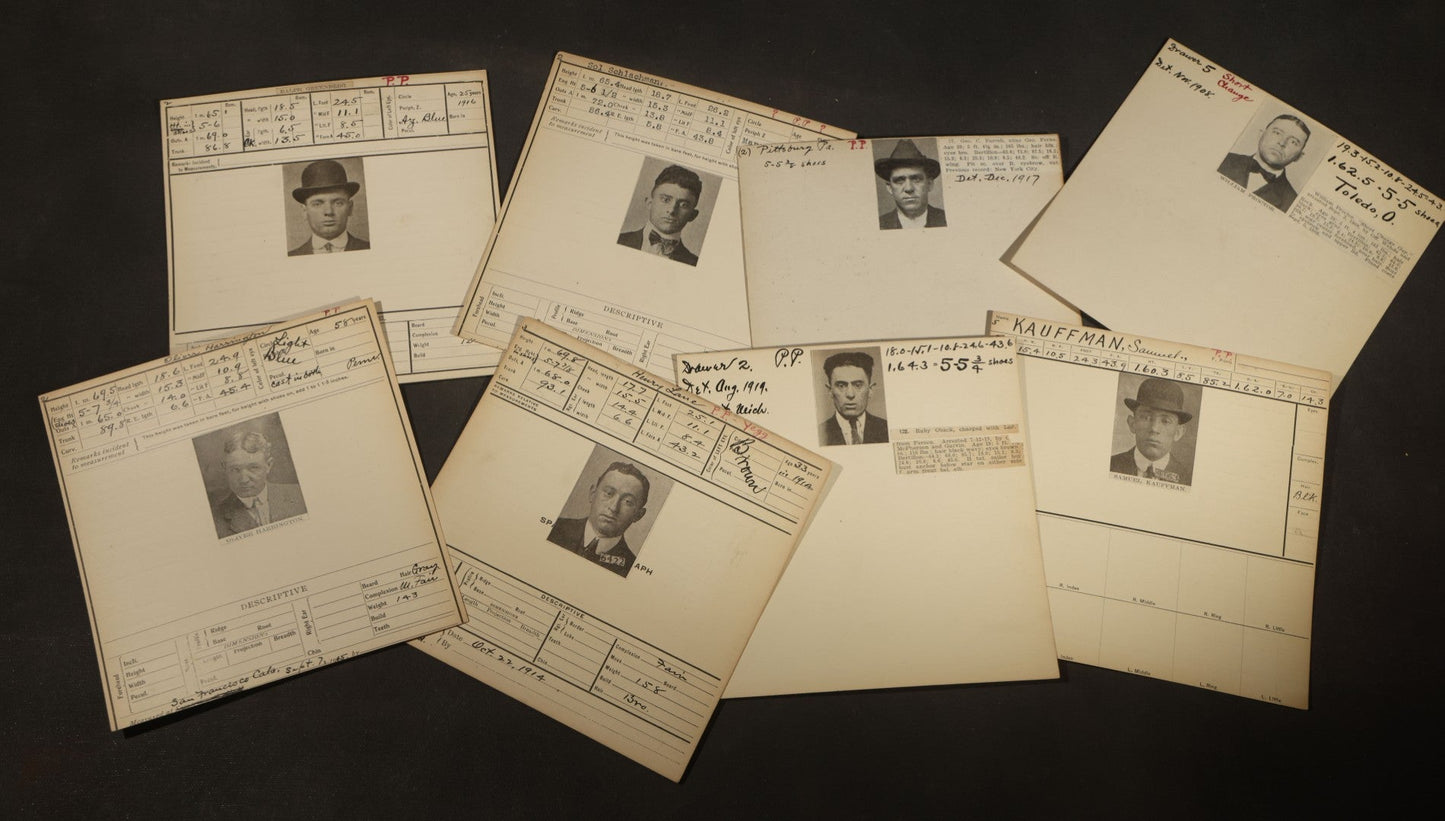 Grouping of Eight Antique Police Mugshot and Arrest Cards with Printed Photographs including Oliver Harrington, San Francisco, Henry Lane, Indianapolis, Ruby Oback, Detroit, and Samuel Kauffman, Newark