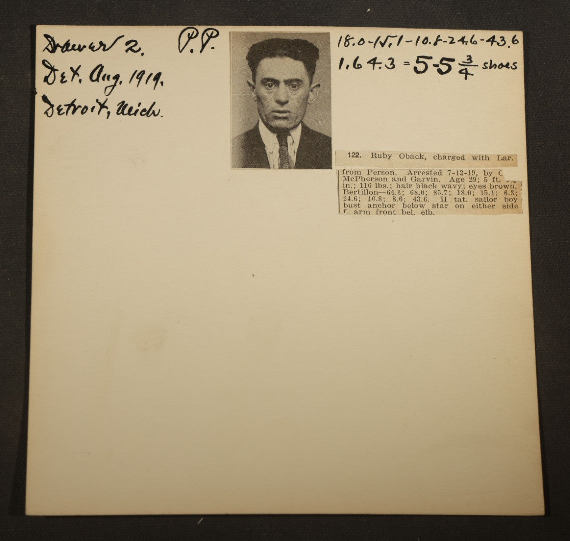 Grouping of Eight Antique Police Mugshot and Arrest Cards with Printed Photographs including Oliver Harrington, San Francisco, Henry Lane, Indianapolis, Ruby Oback, Detroit, and Samuel Kauffman, Newark