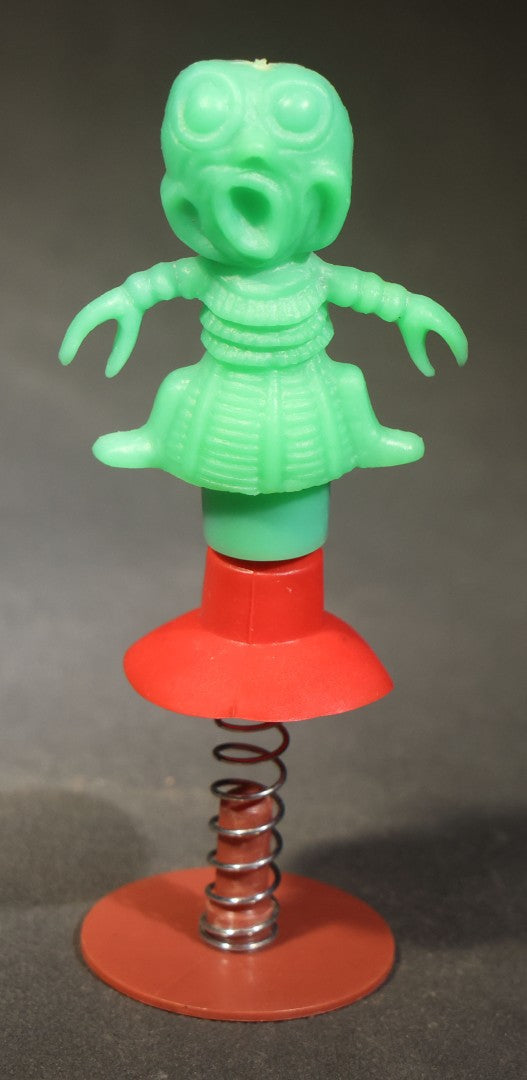 Grouping of 10 Vintage Plastic Space-Themed Jump-Up Spring Toys including Astronauts, Aliens, and Robot, H.F., Made in Hong Kong