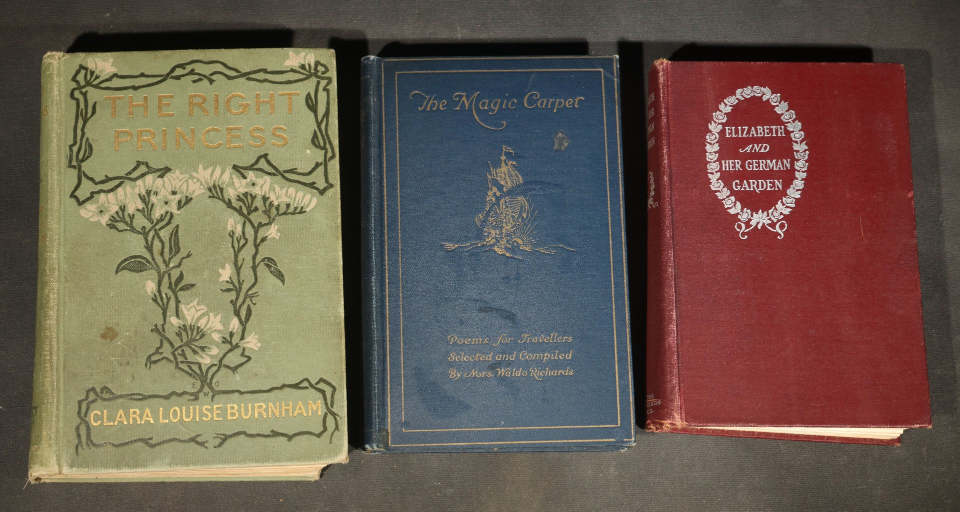 Trio of Antique Books including "The Right Princess" by Clara Louise Burnham, 1902, "The Magic Carpet: Poems for Travellers" by Mrs. Waldo Richards, and "Elizabeth and Her German Garden"