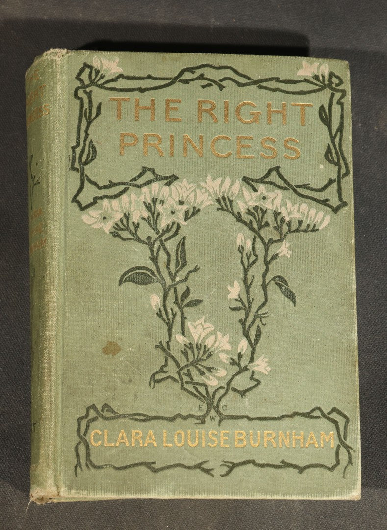 Trio of Antique Books including "The Right Princess" by Clara Louise Burnham, 1902, "The Magic Carpet: Poems for Travellers" by Mrs. Waldo Richards, and "Elizabeth and Her German Garden"