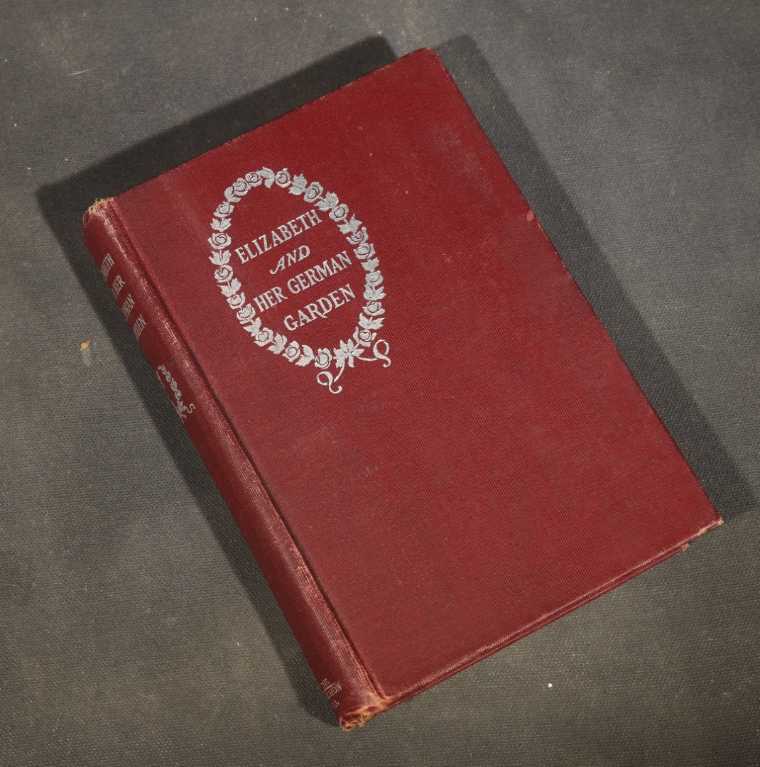 Trio of Antique Books including "The Right Princess" by Clara Louise Burnham, 1902, "The Magic Carpet: Poems for Travellers" by Mrs. Waldo Richards, and "Elizabeth and Her German Garden"