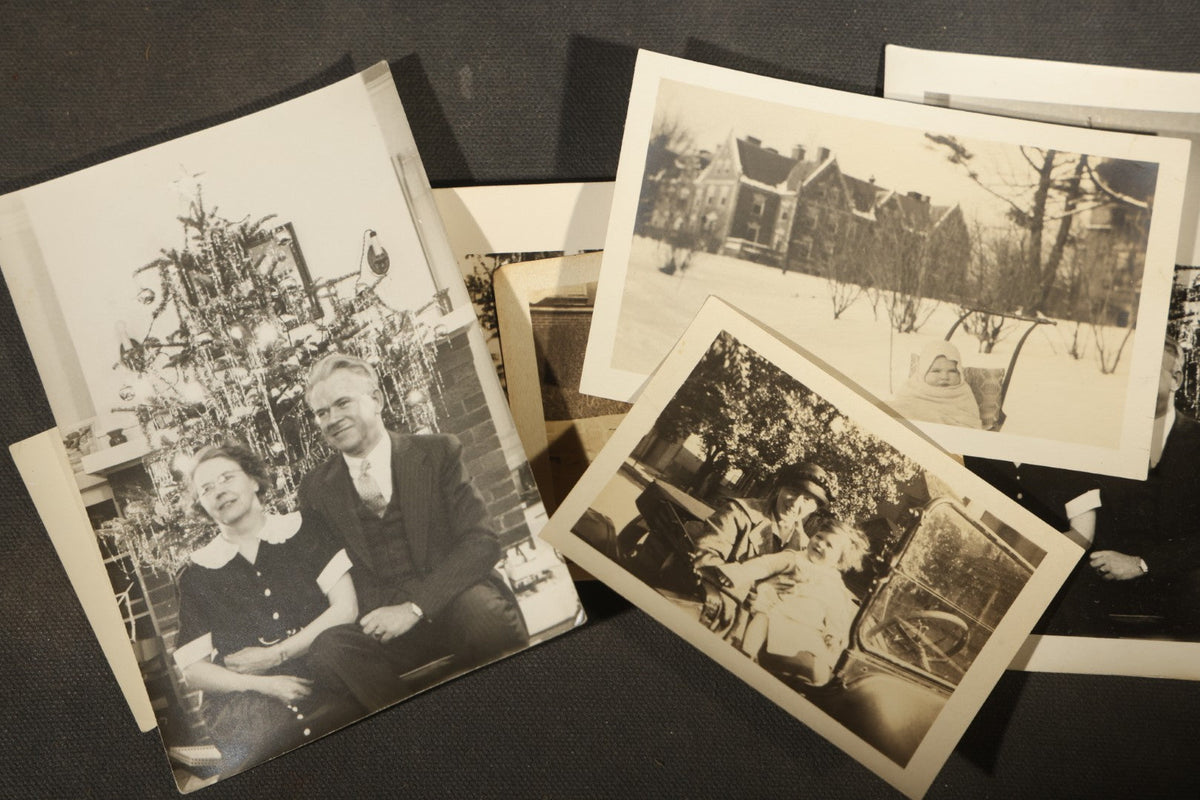 Grouping of 25+ Antique and Vintage Snapshot Photographs including Christmas Tree Portraits, Children with Dogs, Residential Architecture, and Family Scenes