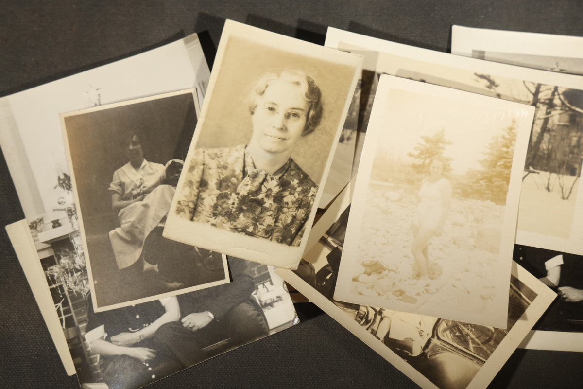 Grouping of 25+ Antique and Vintage Snapshot Photographs including Christmas Tree Portraits, Children with Dogs, Residential Architecture, and Family Scenes