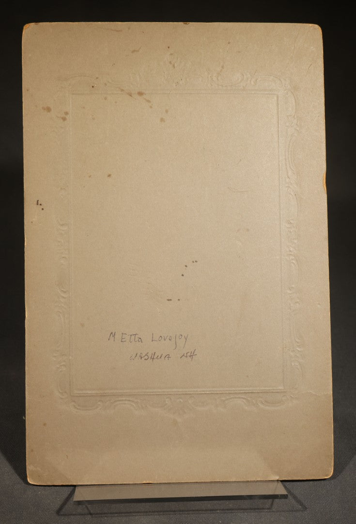 Pair of Antique Photographs including Woman in Gold-Painted Embossed Frame with Oval Window and Board-Mounted Portrait of a Young Girl with Decorative Border