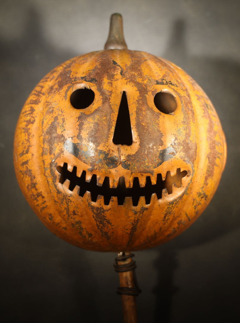Antique Pressed Tin Halloween Jack-O-Lantern Pumpkin Parade Lantern on Bamboo Stick with Interior Candle Cup, Attributed to Toledo Metal Sign Company, Toledo, Ohio, Circa 1905-1910