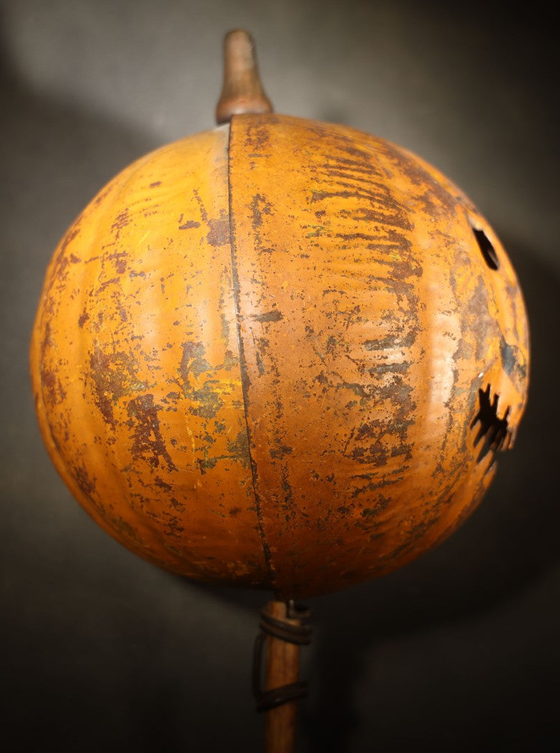 Antique Pressed Tin Halloween Jack-O-Lantern Pumpkin Parade Lantern on Bamboo Stick with Interior Candle Cup, Attributed to Toledo Metal Sign Company, Toledo, Ohio, Circa 1905-1910