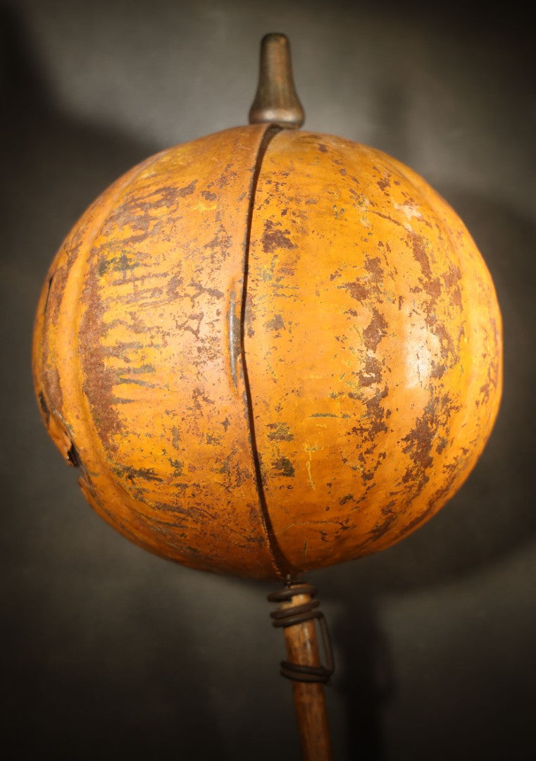 Antique Pressed Tin Halloween Jack-O-Lantern Pumpkin Parade Lantern on Bamboo Stick with Interior Candle Cup, Attributed to Toledo Metal Sign Company, Toledo, Ohio, Circa 1905-1910
