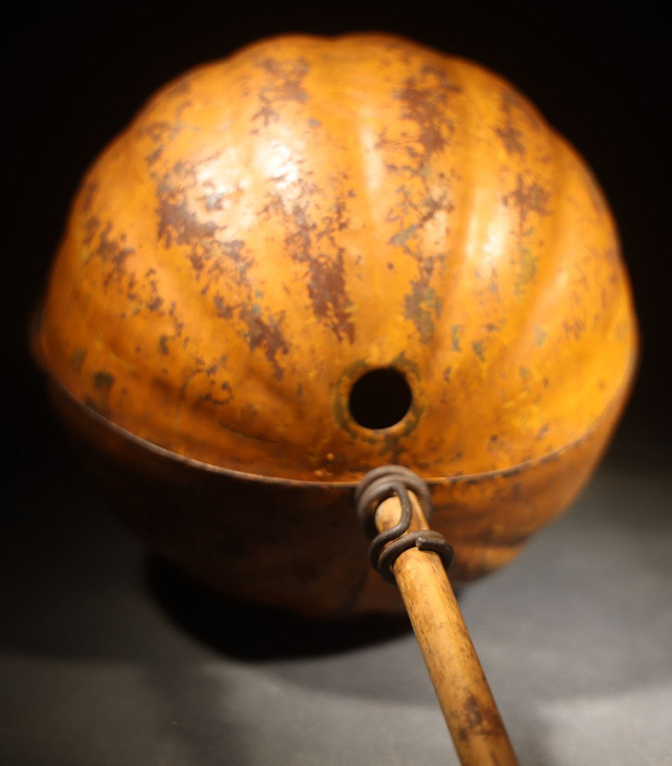 Antique Pressed Tin Halloween Jack-O-Lantern Pumpkin Parade Lantern on Bamboo Stick with Interior Candle Cup, Attributed to Toledo Metal Sign Company, Toledo, Ohio, Circa 1905-1910