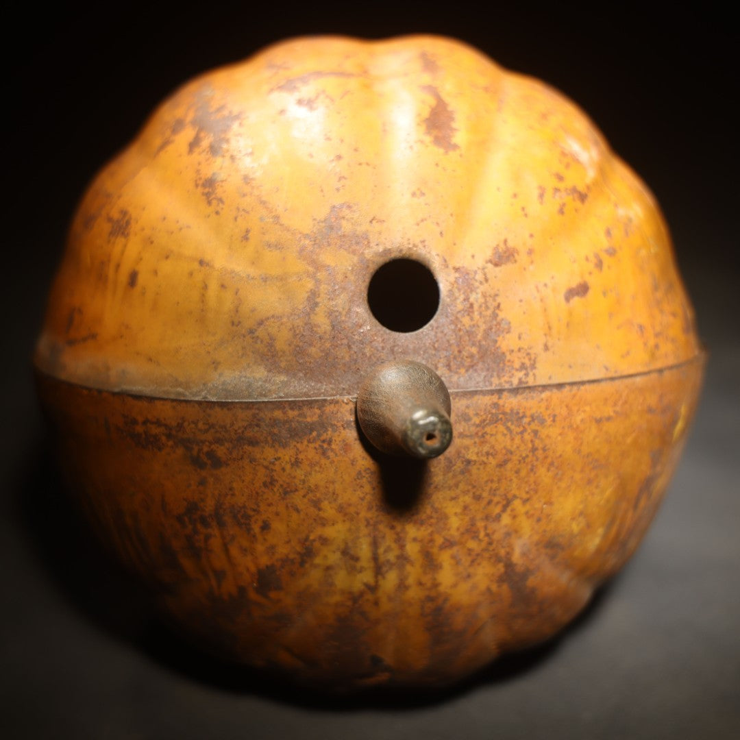 Antique Pressed Tin Halloween Jack-O-Lantern Pumpkin Parade Lantern on Bamboo Stick with Interior Candle Cup, Attributed to Toledo Metal Sign Company, Toledo, Ohio, Circa 1905-1910