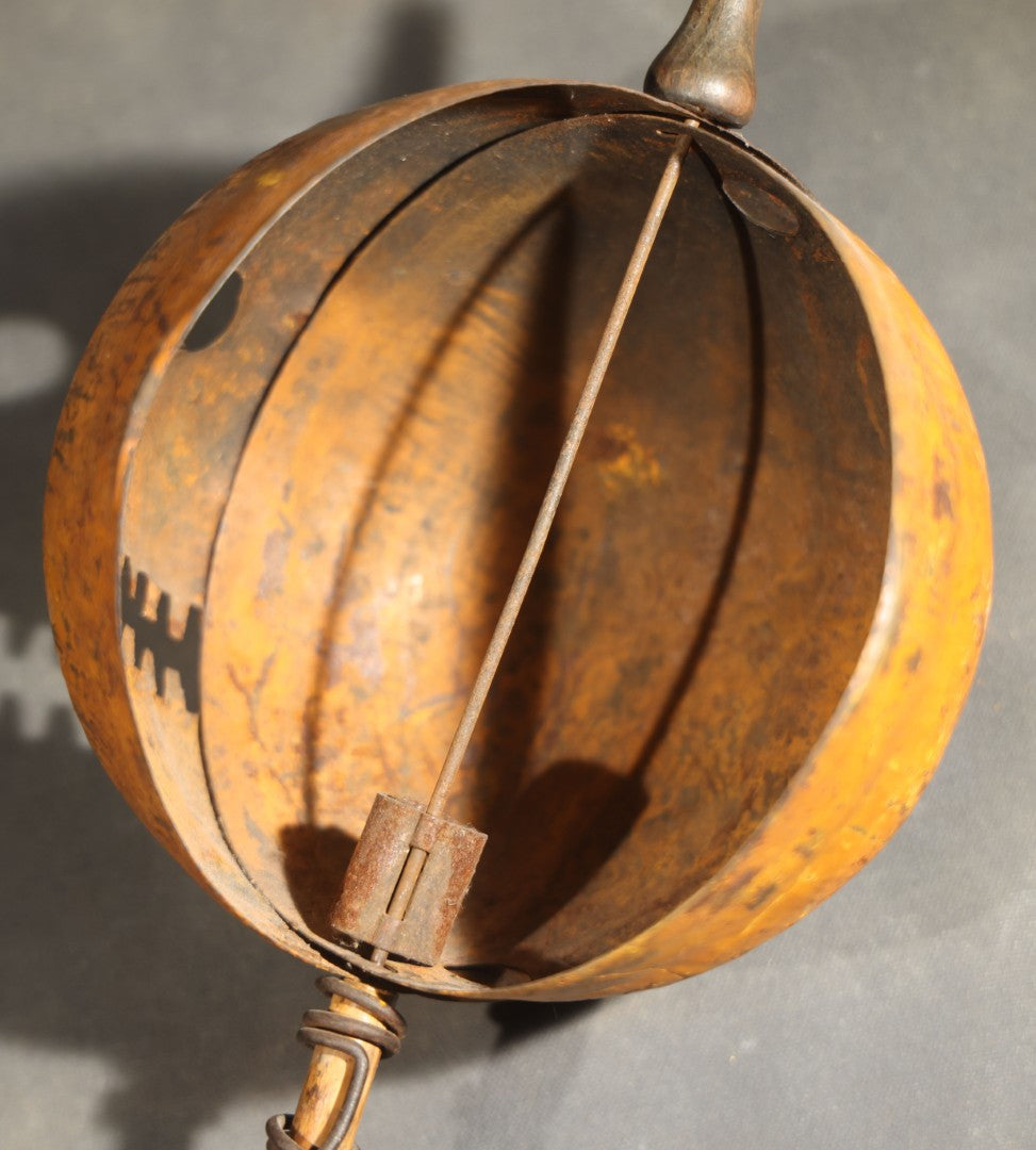Antique Pressed Tin Halloween Jack-O-Lantern Pumpkin Parade Lantern on Bamboo Stick with Interior Candle Cup, Attributed to Toledo Metal Sign Company, Toledo, Ohio, Circa 1905-1910