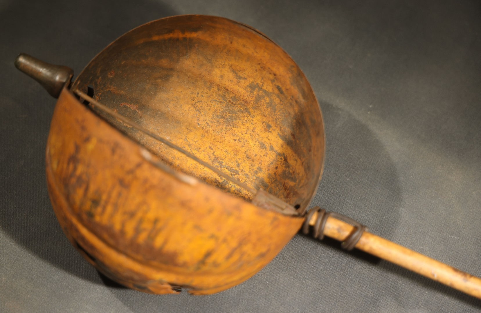Antique Pressed Tin Halloween Jack-O-Lantern Pumpkin Parade Lantern on Bamboo Stick with Interior Candle Cup, Attributed to Toledo Metal Sign Company, Toledo, Ohio, Circa 1905-1910