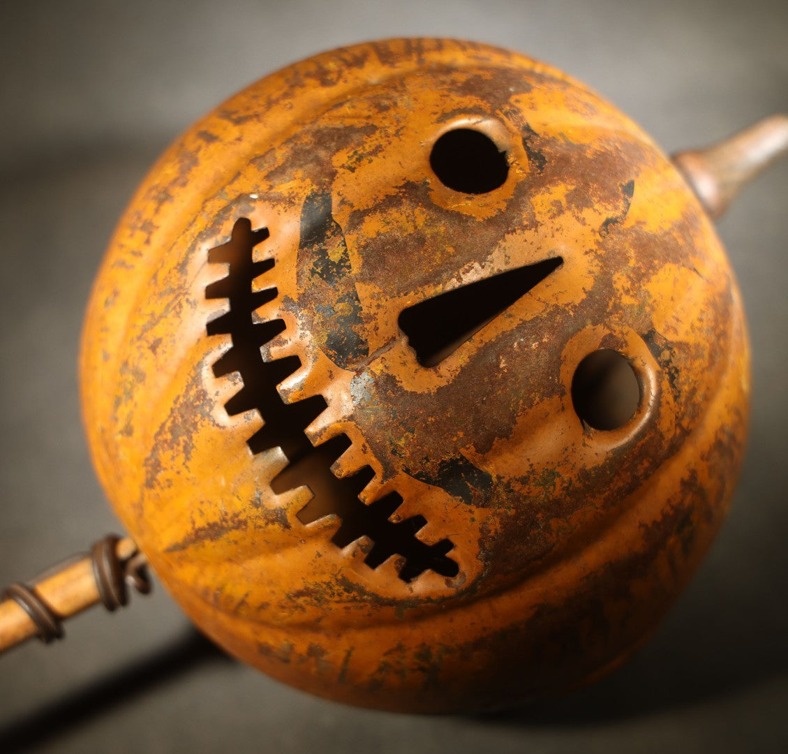 Antique Pressed Tin Halloween Jack-O-Lantern Pumpkin Parade Lantern on Bamboo Stick with Interior Candle Cup, Attributed to Toledo Metal Sign Company, Toledo, Ohio, Circa 1905-1910