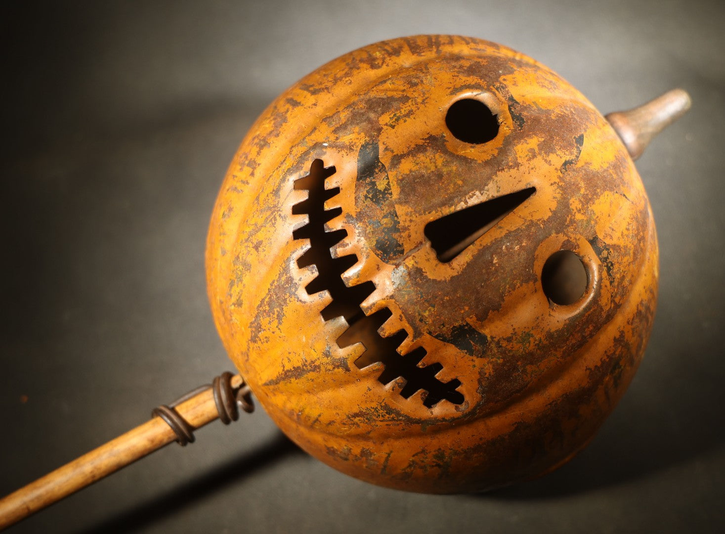 Antique Pressed Tin Halloween Jack-O-Lantern Pumpkin Parade Lantern on Bamboo Stick with Interior Candle Cup, Attributed to Toledo Metal Sign Company, Toledo, Ohio, Circa 1905-1910