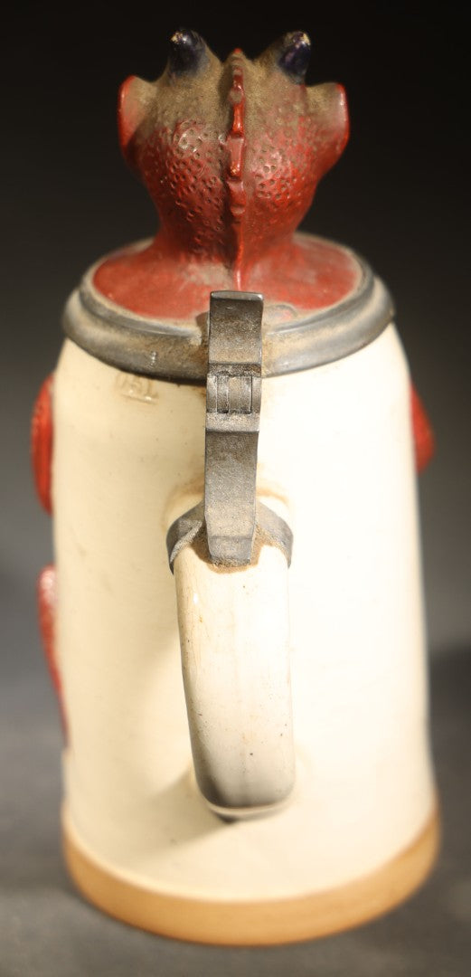 Antique German Figural Devil Beer Stein with Pewter Rimmed Lid, "Wer mit mir schließt einen Pakt, dem bleibt der Magen stets intakt" ("Whoever Makes a Pact with Me, Their Stomach Will Always Remain Intact"), Mold 1565