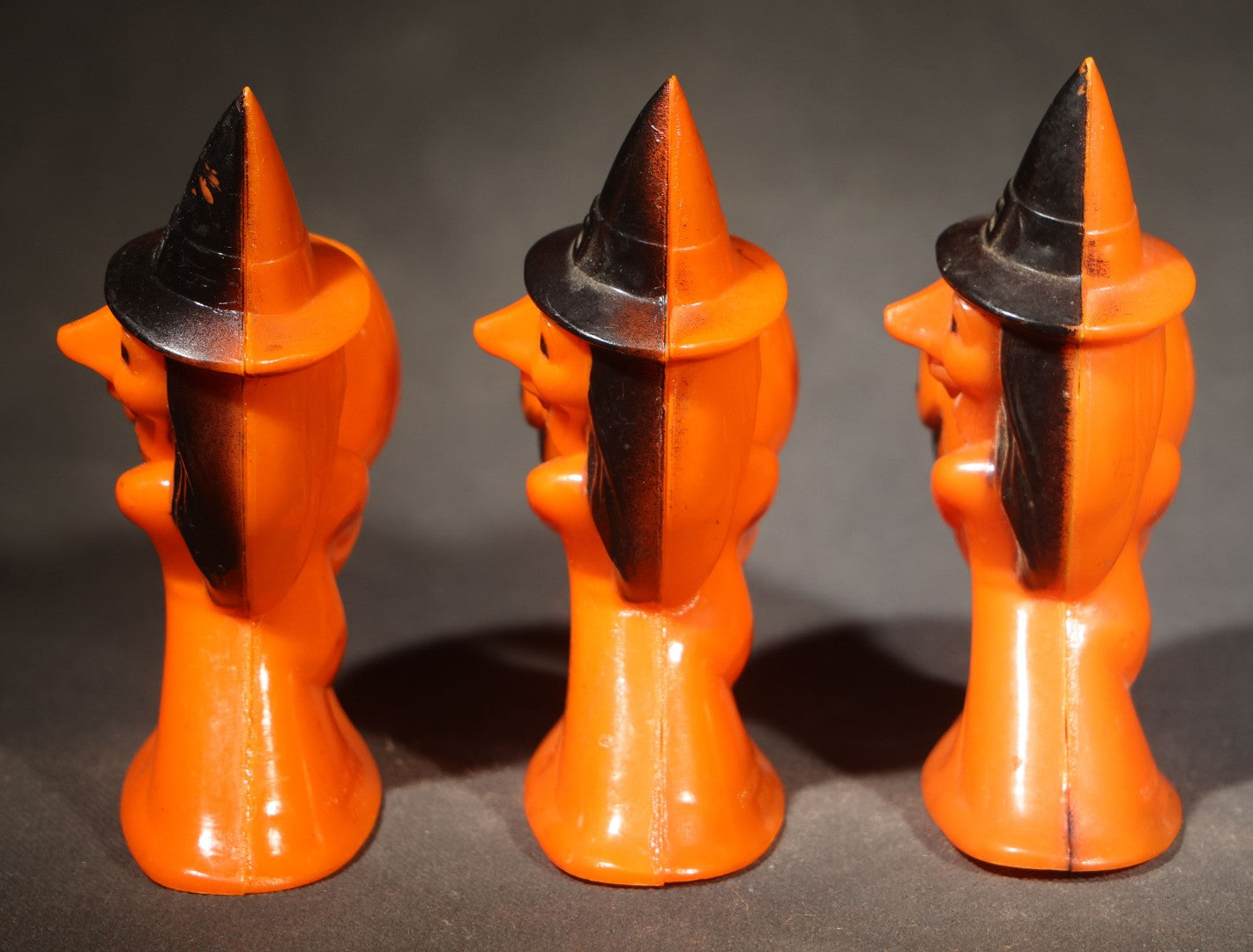 Trio of Vintage Plastic Halloween Witch Holding Jack-O-Lantern Candy Containers, Circa 1950s, Manufactured by Rosbro Plastics, Pawtucket, Rhode Island