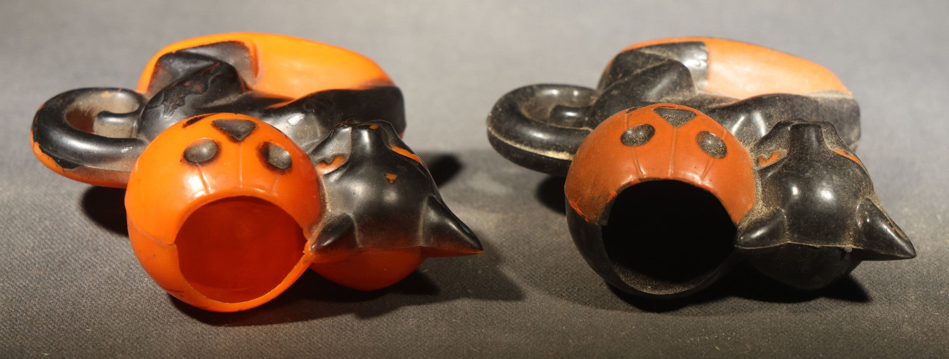 Grouping of Four Vintage Plastic Halloween Cat Holding Jack-O-Lantern Candy Containers, Circa 1950s, Manufactured by Rosbro Plastics, Pawtucket, Rhode Island
