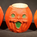 Lot 021 - Trio of Vintage Papier Mache / Paper Pulp Halloween Choir Boy Jack-O-Lantern Pumpkin Nut Cups with Green-Painted Features Including One with Original Paper Insert
