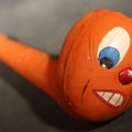 Lot 027 - Vintage German Fantasy Reproduction Papier Mache / Molded Paper Halloween Jack-O-Lantern Horn Noisemaker with Wooden Mouthpiece, Circa 1990s, 6-3/4" L
