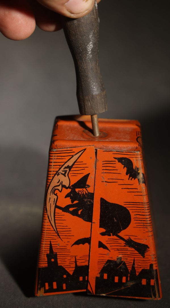 Vintage Halloween Tin Lithograph Bell Noisemaker with Jack-O-Lantern, Black Cat, Man in the Moon, Witch on Broomstick, Bats, and Town Silhouette