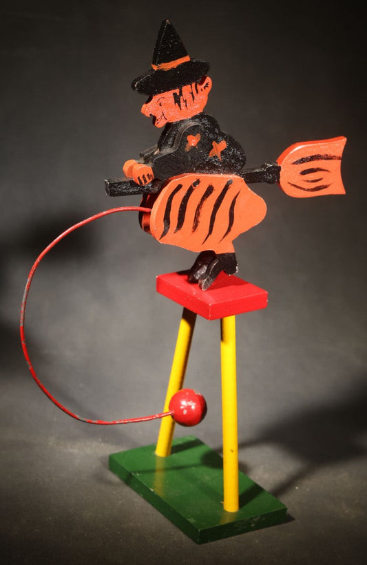Vintage Painted Wooden Halloween Balancing Witch on Broomstick with Wire and Ball Counterweight, Circa 1990s