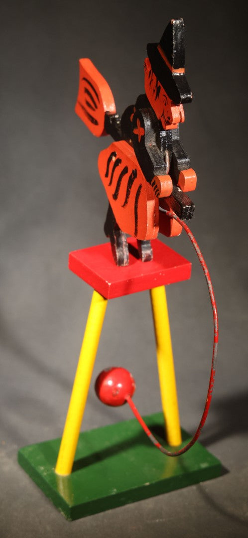 Vintage Painted Wooden Halloween Balancing Witch on Broomstick with Wire and Ball Counterweight, Circa 1990s