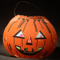 Lot 038 - Vintage Slot-And-Tab Cardboard Jack-O-Lantern Pumpkin Lantern with Wire Handle, Tissue Paper Inserts, and Interior Candle Socket, Manufactured by Dolly Toy Company, Dayton, Ohio, Circa 1930s-1950s, 6-1/2" H