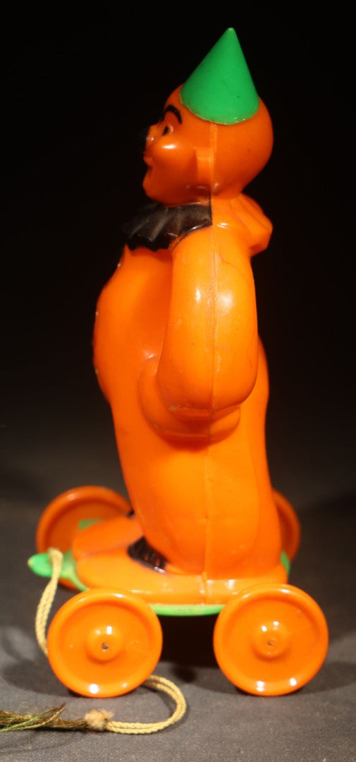 Vintage Plastic Halloween Clown Pull Toy Candy Container, Circa 1950s, Manufactured by Rosbro Plastics, Pawtucket, Rhode Island (Green Hat & Base)