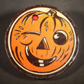 Lot 049 - Vintage Halloween Tin Lithograph Spinning Ratchet Noisemaker with Winking Jack-O-Lantern, Manufactured by Kirchhof, Newark, New Jersey, Made in U.S.A., 4" W