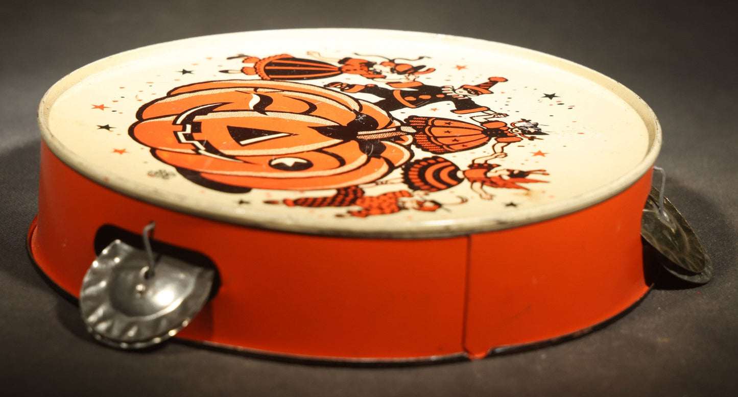 Vintage Halloween Tin Lithograph Toy Tambourine Noisemaker with Jack-O-Lantern Pumpkin and Costume Parade Graphics, Manufactured by U.S. Metal Toy Mfg. Co., Made in U.S.A.