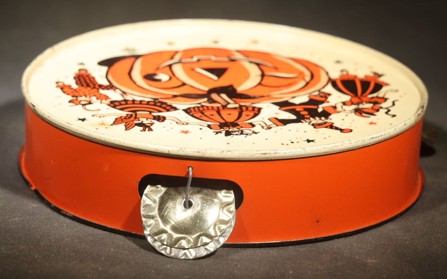 Vintage Halloween Tin Lithograph Toy Tambourine Noisemaker with Jack-O-Lantern Pumpkin and Costume Parade Graphics, Manufactured by U.S. Metal Toy Mfg. Co., Made in U.S.A.